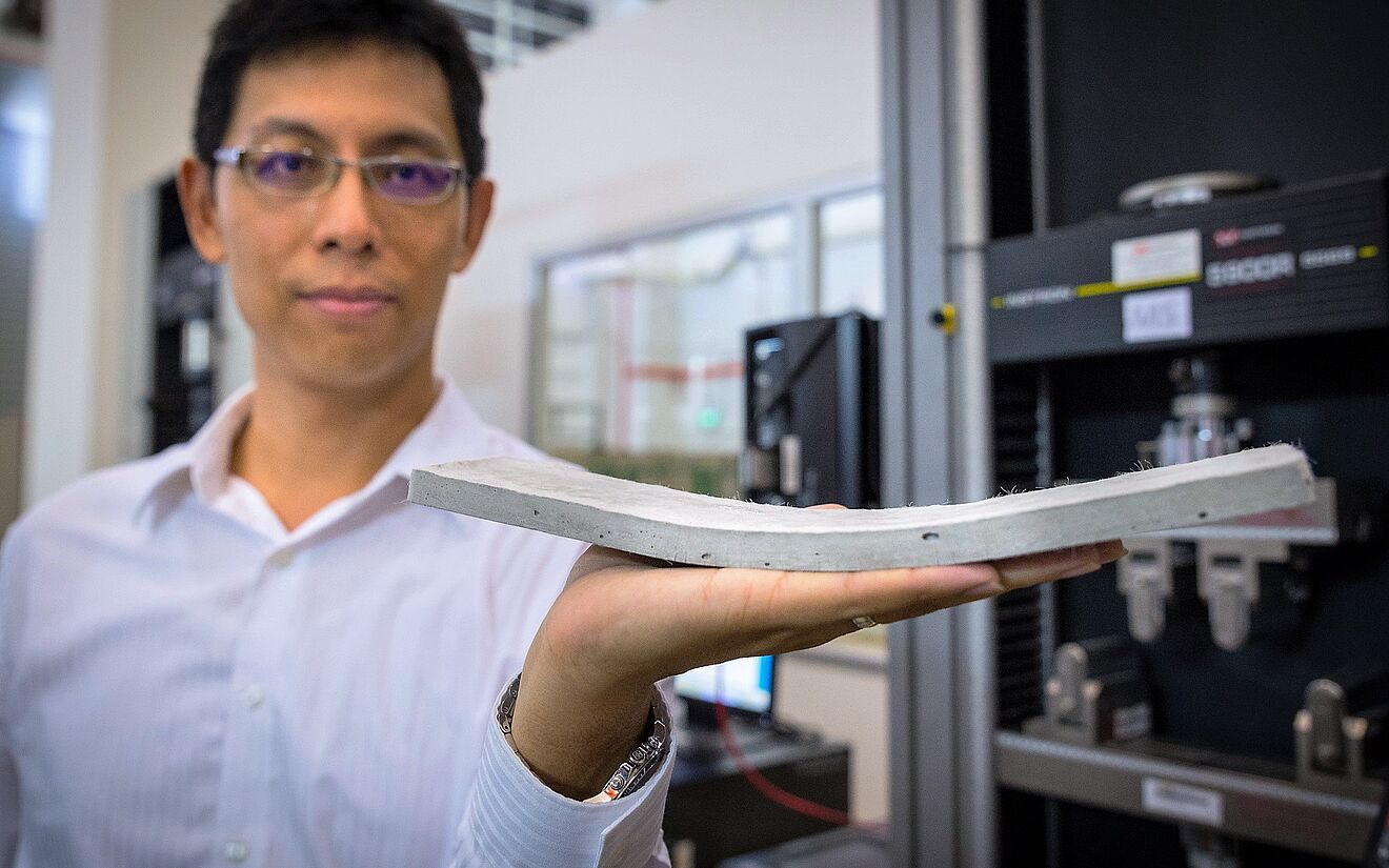 NTU Assistant Professor Yang En-Hua shows the flexible concrete, which his team has developed